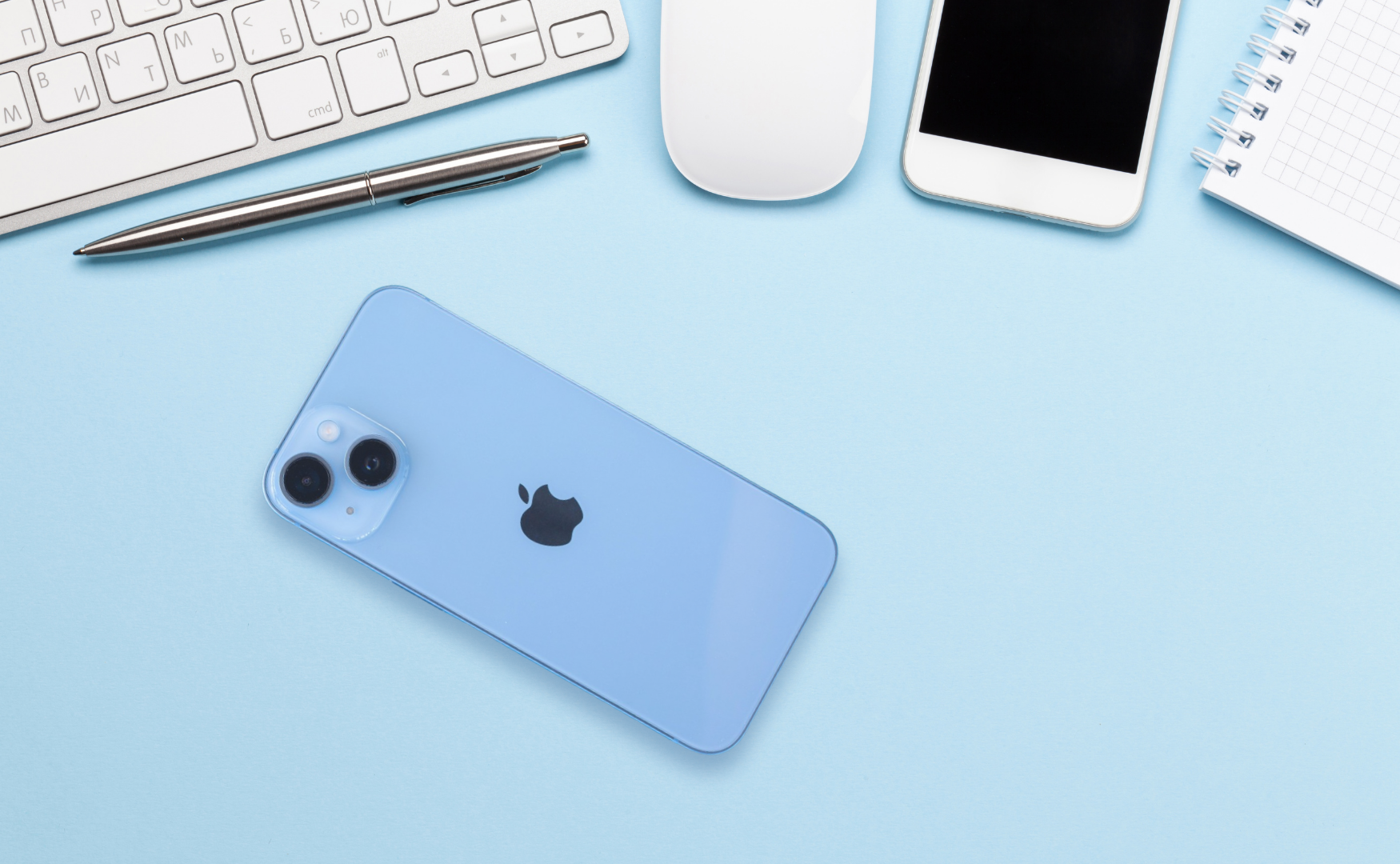 Iphone 14 Colours: A Style Guide For Every Shade Iphone 14 colours: blue on blue desk