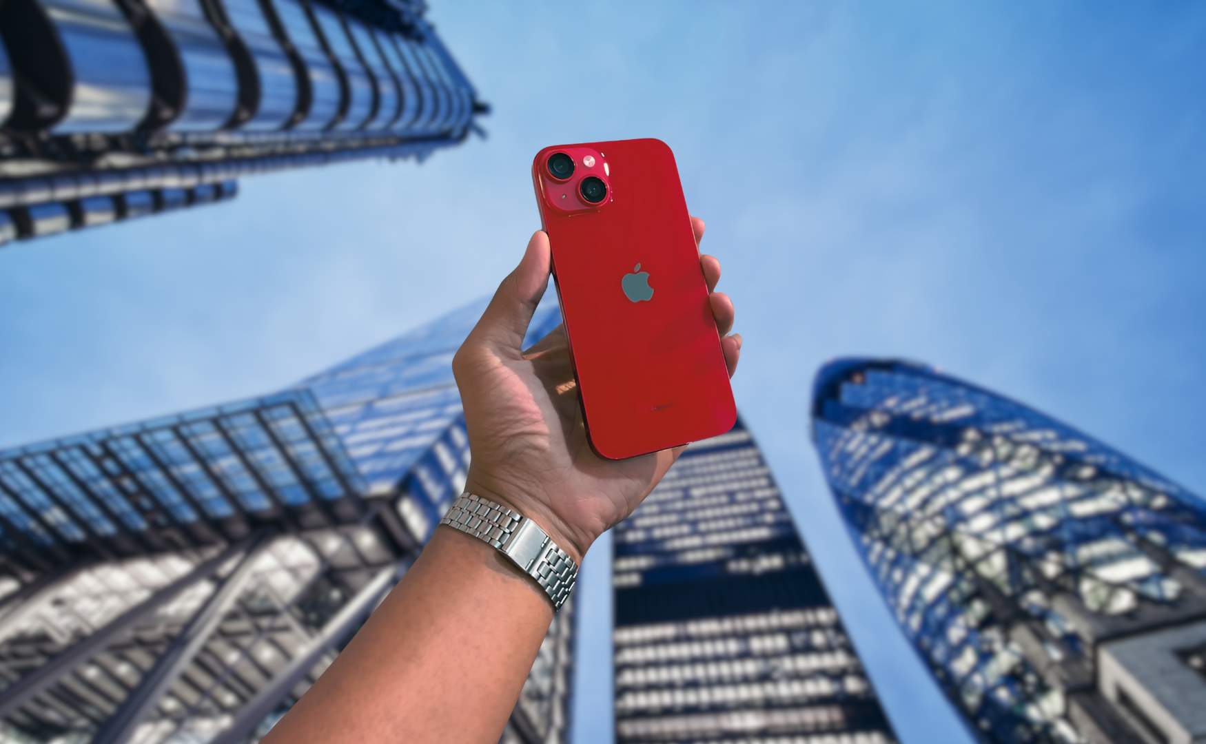 Iphone 14 Colours: A Style Guide For Every Shade Iphone 14 colours: red, surrounded by city buildings