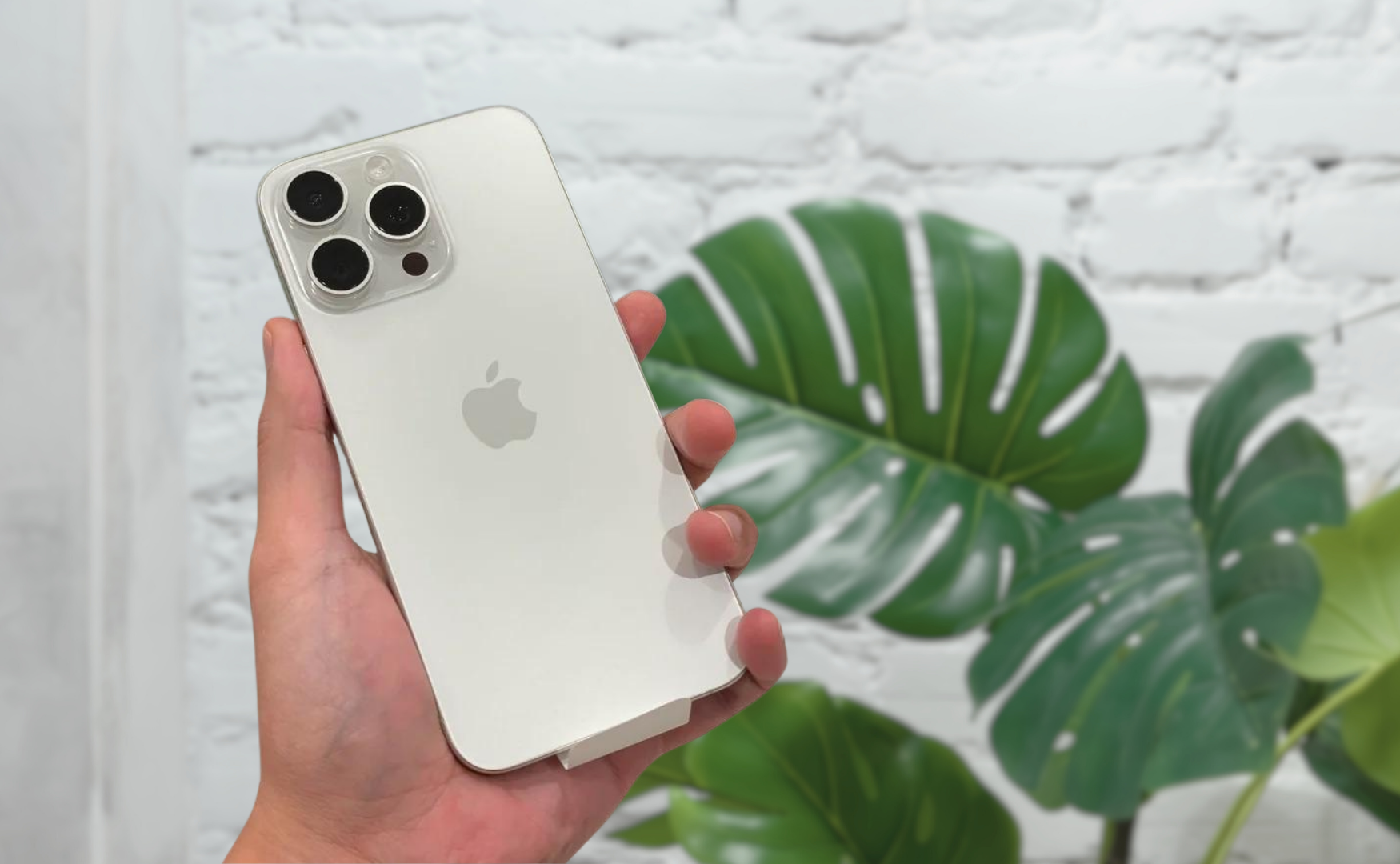 Iphone 15 Pro Colours: A Material-Driven Guide Iphone 15 pro colours: white titanium, hand holding phone