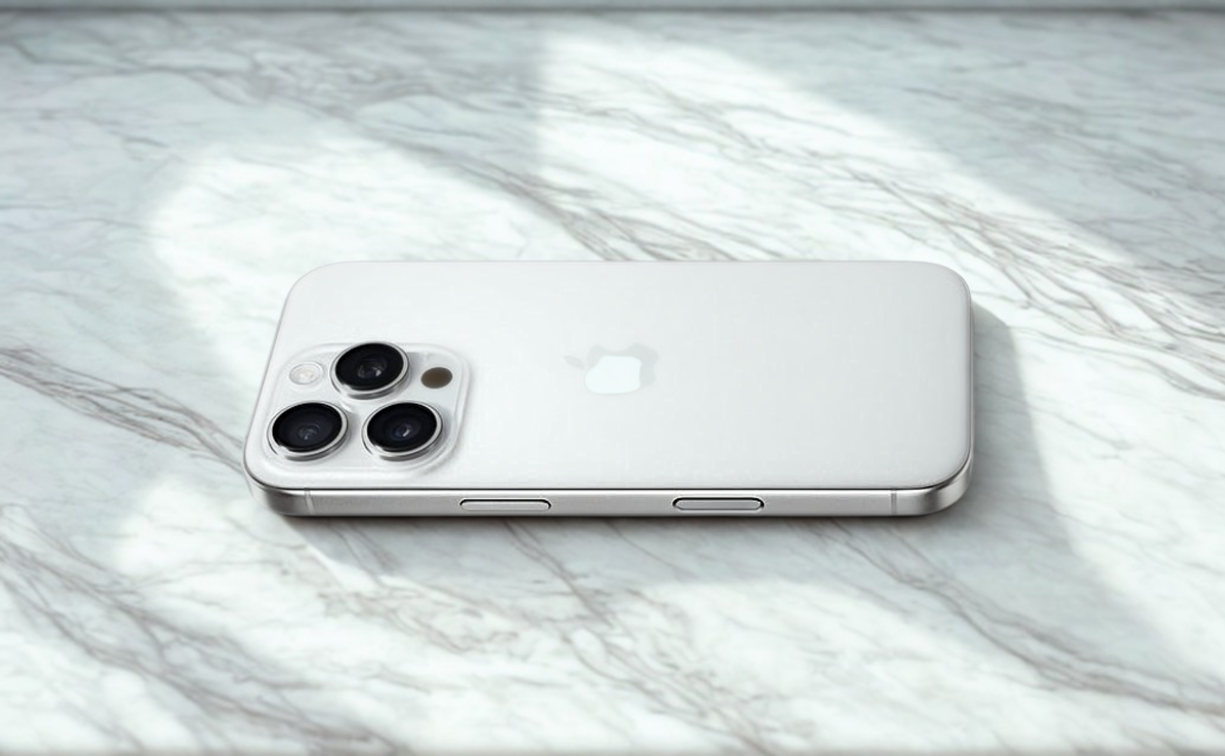 Iphone 16 Pro Colours: A Complete Style And Material Guide Iphone 16 pro colours: white titanium on a white marble floor