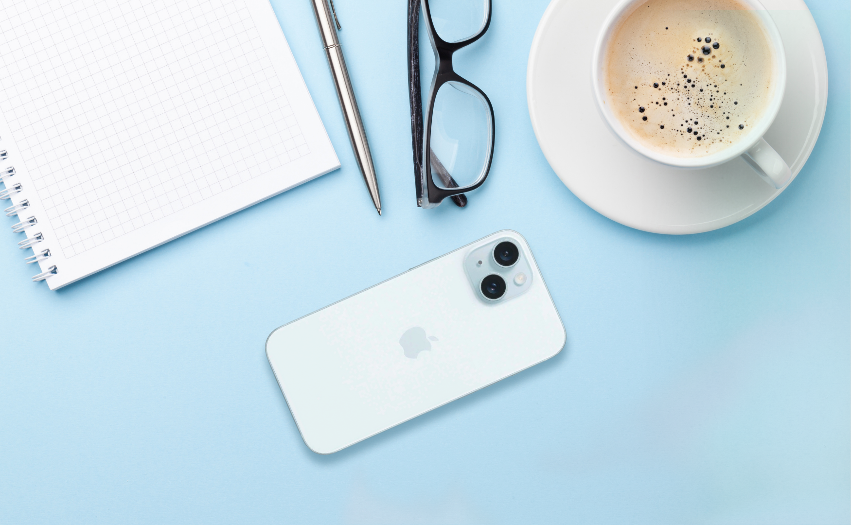 Iphone 15 Colours: Which One Matches Your Mood? Iphone 15 blue on blue desk