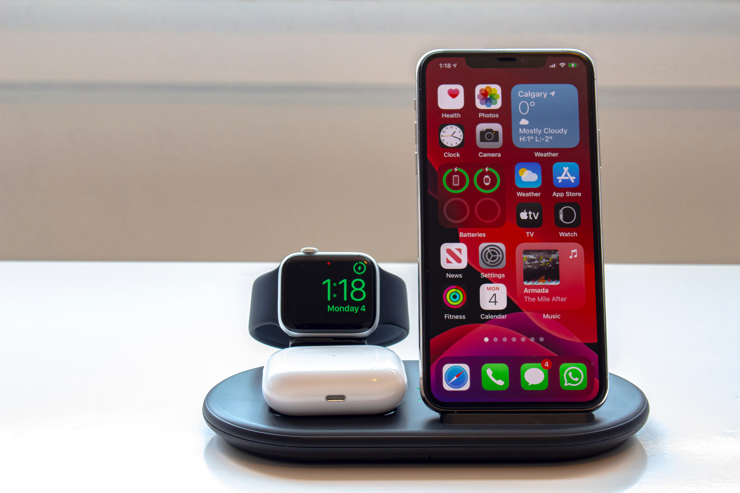 The Ultimate Guide To Charging Your Phone: Tips, Tools &Amp; Smart Habits Charging station with phone, apple smartwatch and airpods case