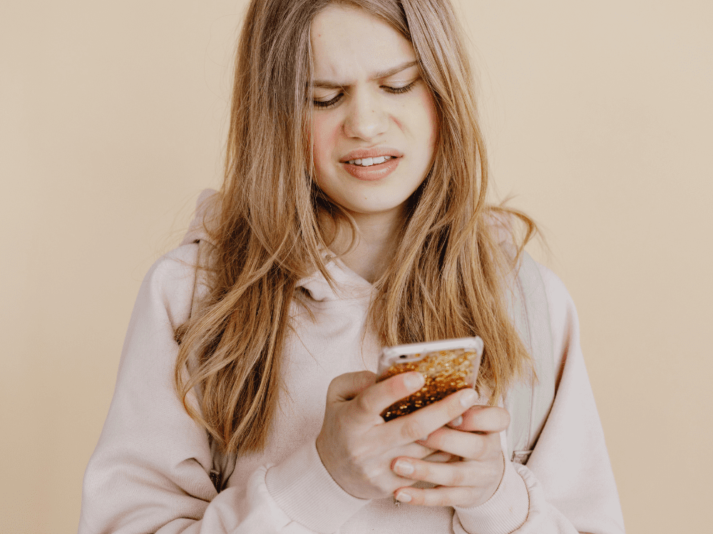 Woman confused using phone