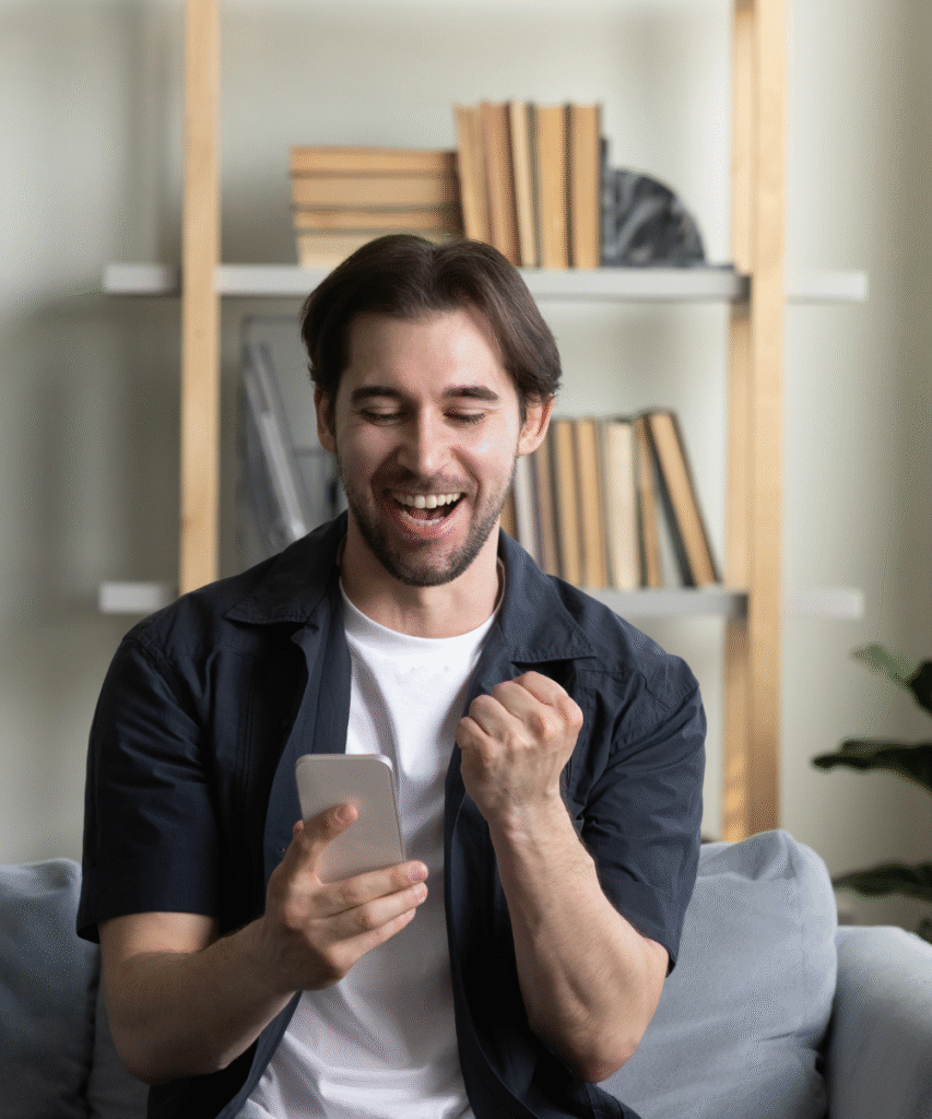 Man cheering with refurbished samsung
