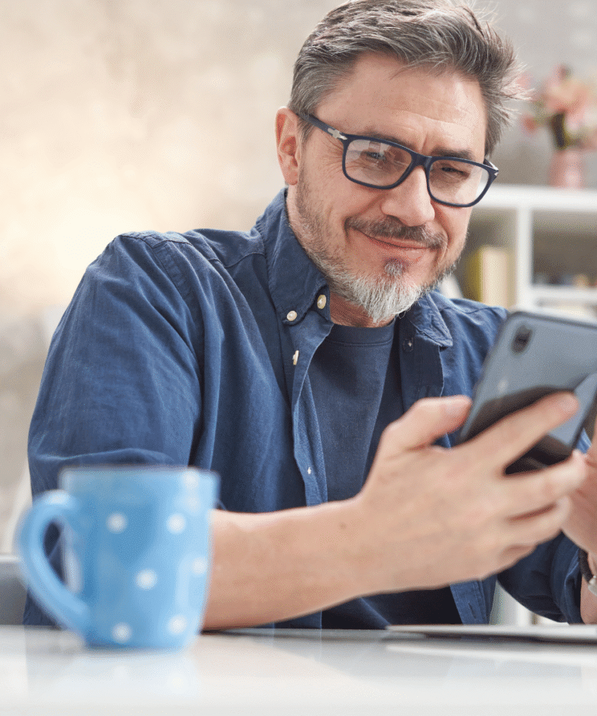 Man grinning at refurbished samsung