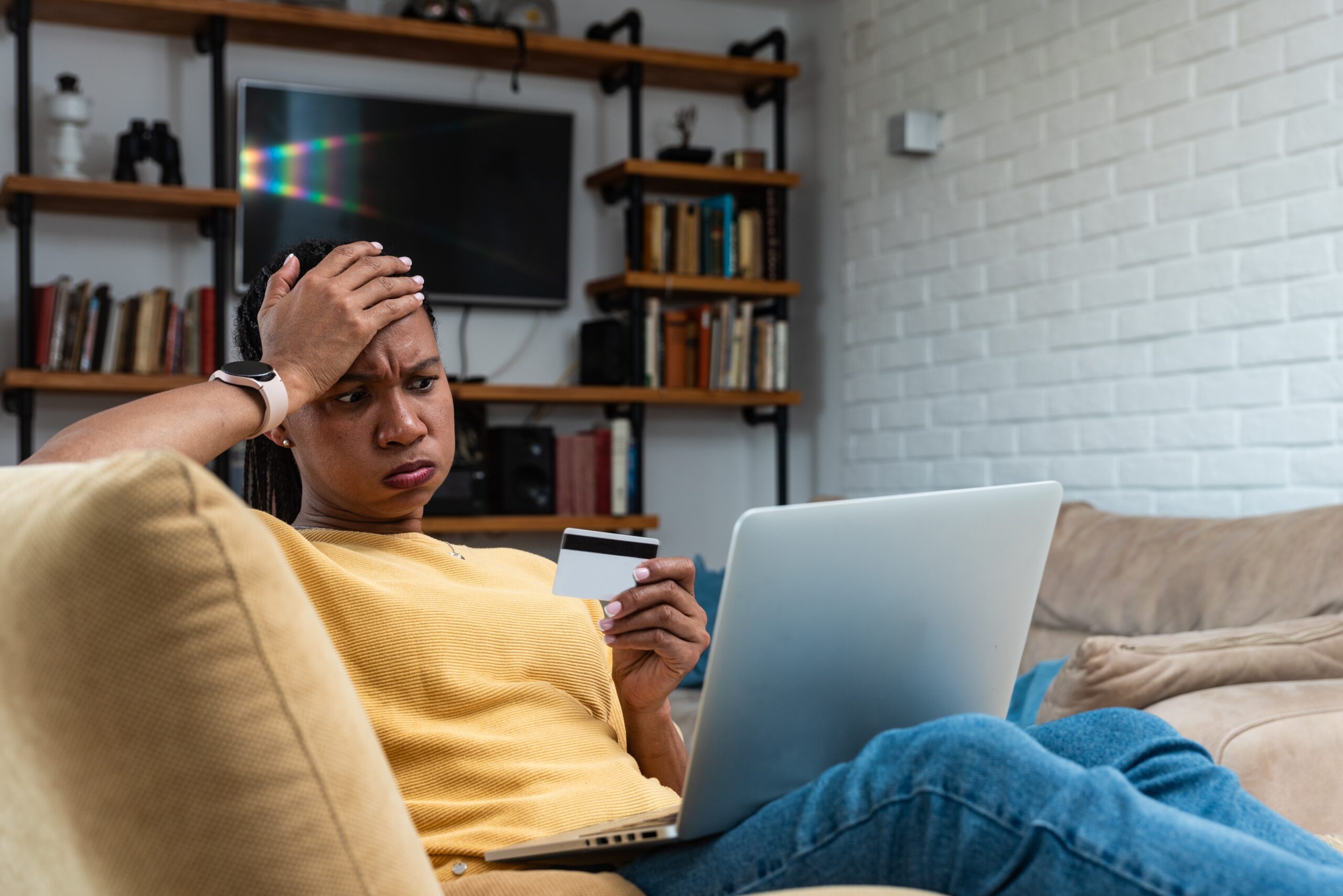 Stolen,information,in,payment,process. ,confused,female,hold,plastic,bank