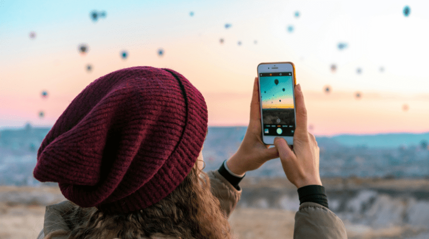 Women using unlocked phone on holiday