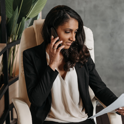 Lawyer on phone checking papers